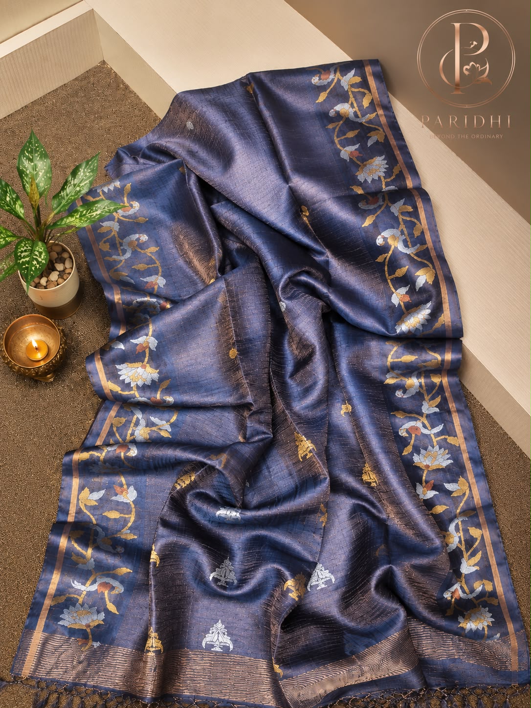 Slate navy tissue tassar Benarasi saree with gold lotus creeper and copper zari bands
