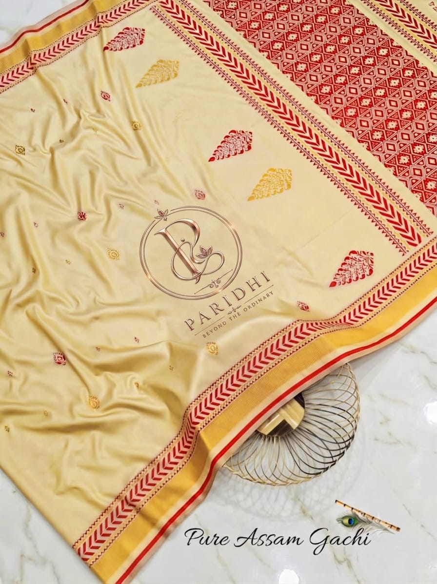 Cream Assam gachi tasar saree with red achal