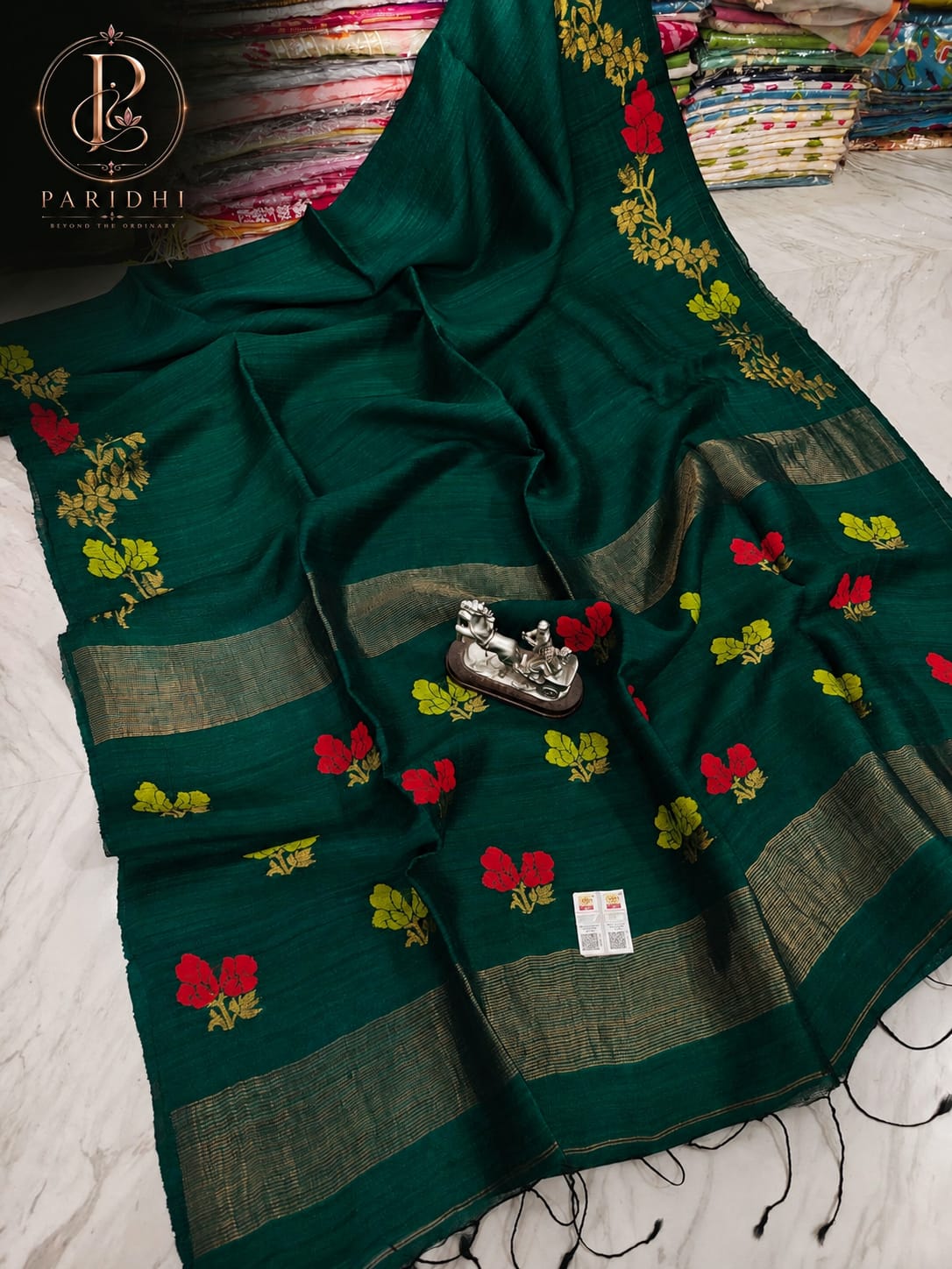 Bottle green Motka Benarasi saree with hand-woven red and yellow resham buta and gold zari border