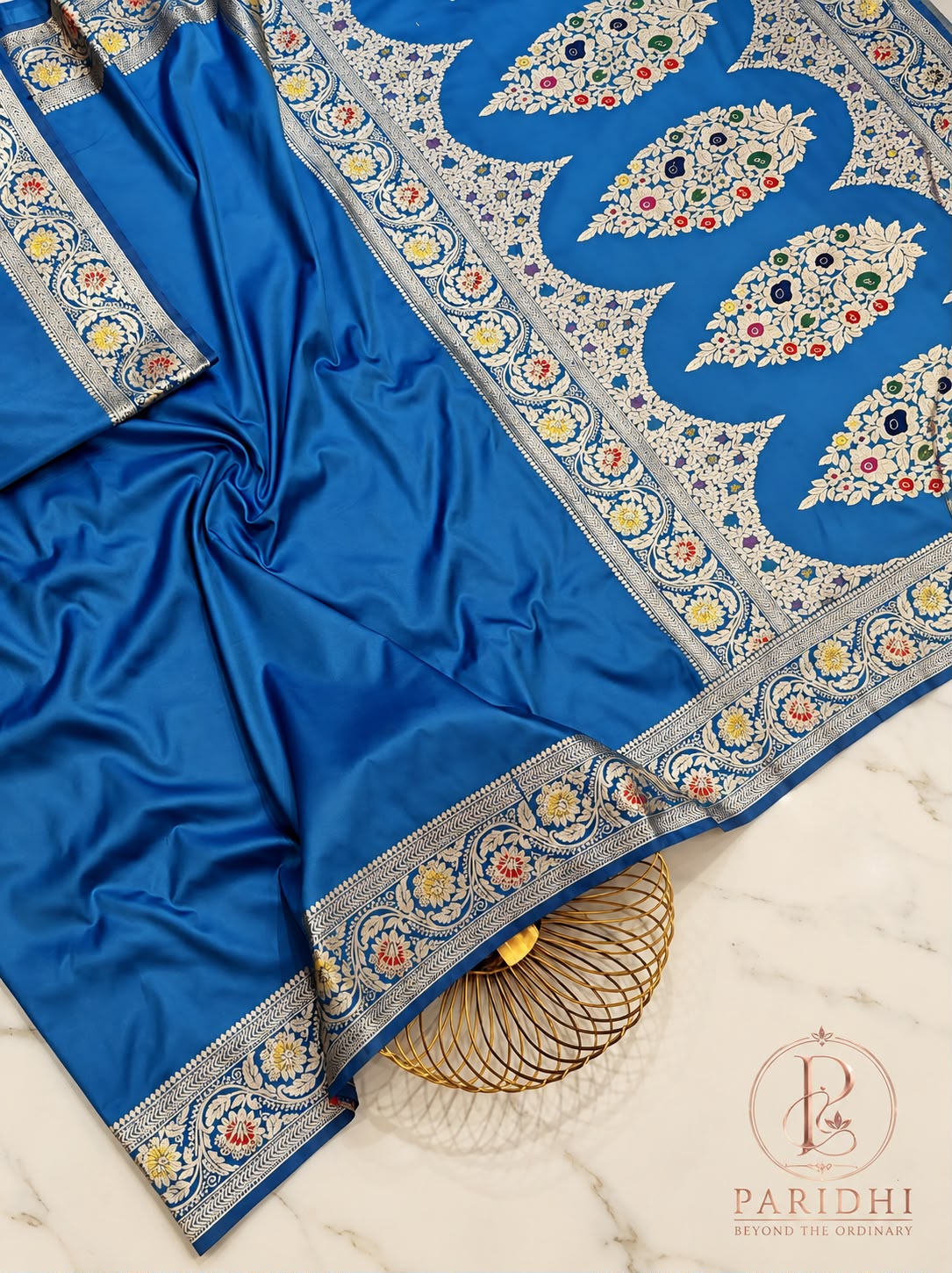 Azure blue glossy mashroo saree with silver kalka pallu