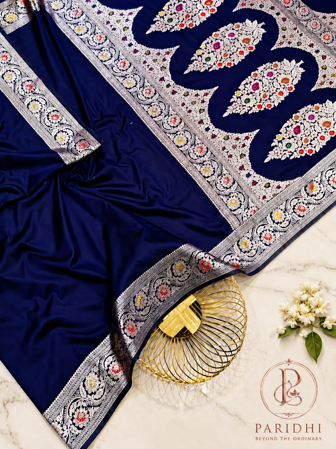 Navy blue soft silk mashroo saree with silver floral border