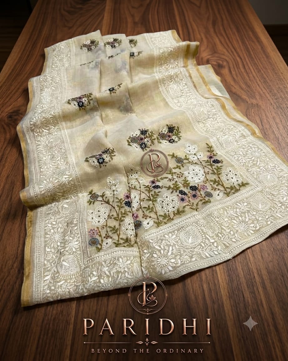 Ivory linen tissue saree with lilac and charcoal resham embroidery