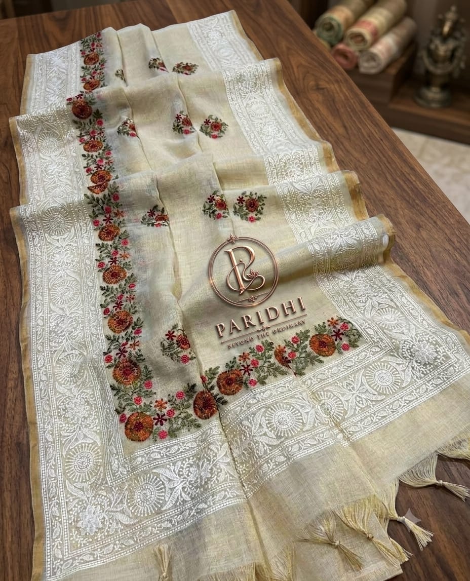Ivory linen tissue saree with marigold and red resham embroidery