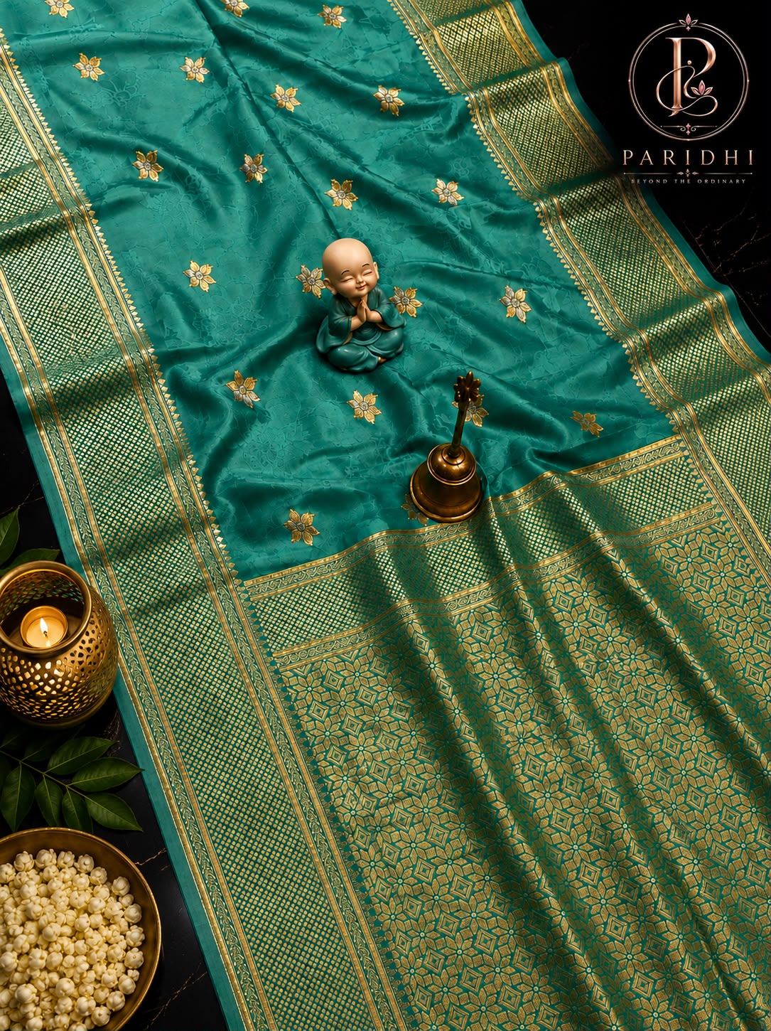 Sea green Tanchui katan silk saree with gold geometric pallu