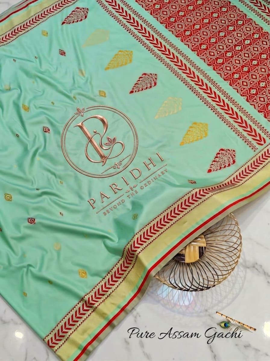 Mint green Assam gachi tasar saree with red achal