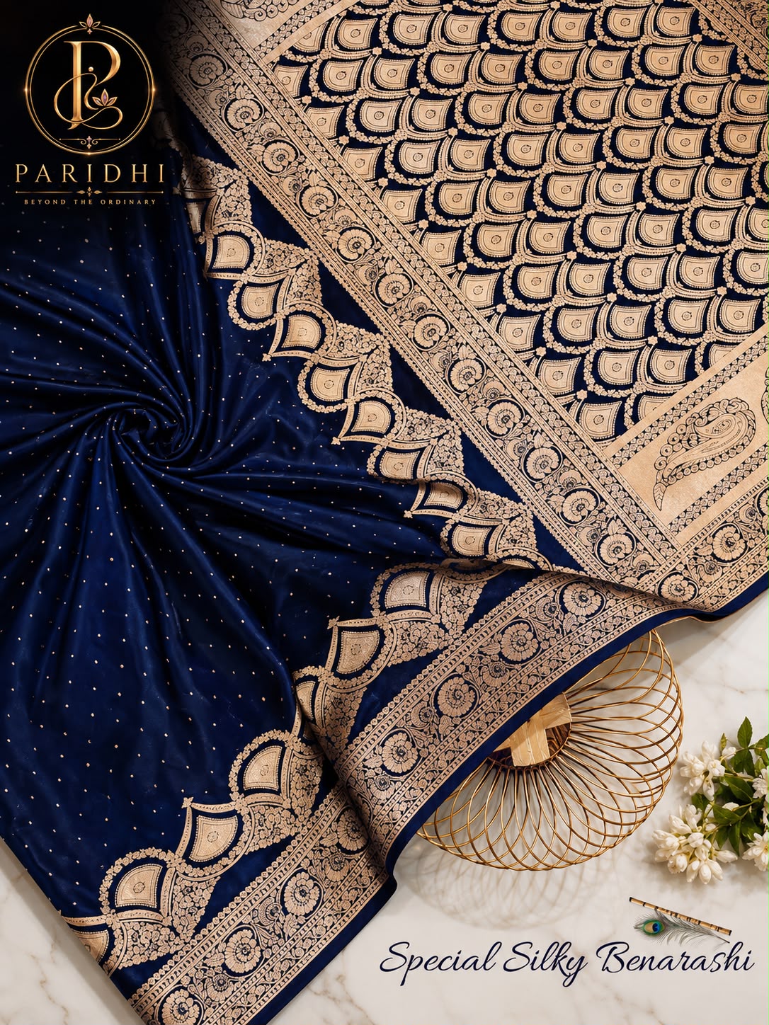 Bindiya Benarashi saree in royal navy with gold chunri butta