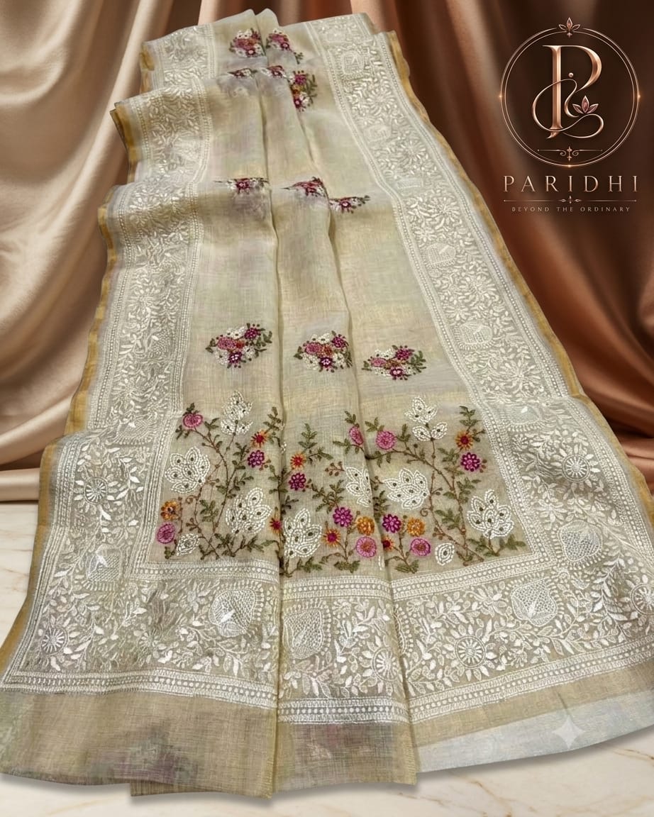 Ivory linen tissue saree with blush and fuchsia resham embroidery