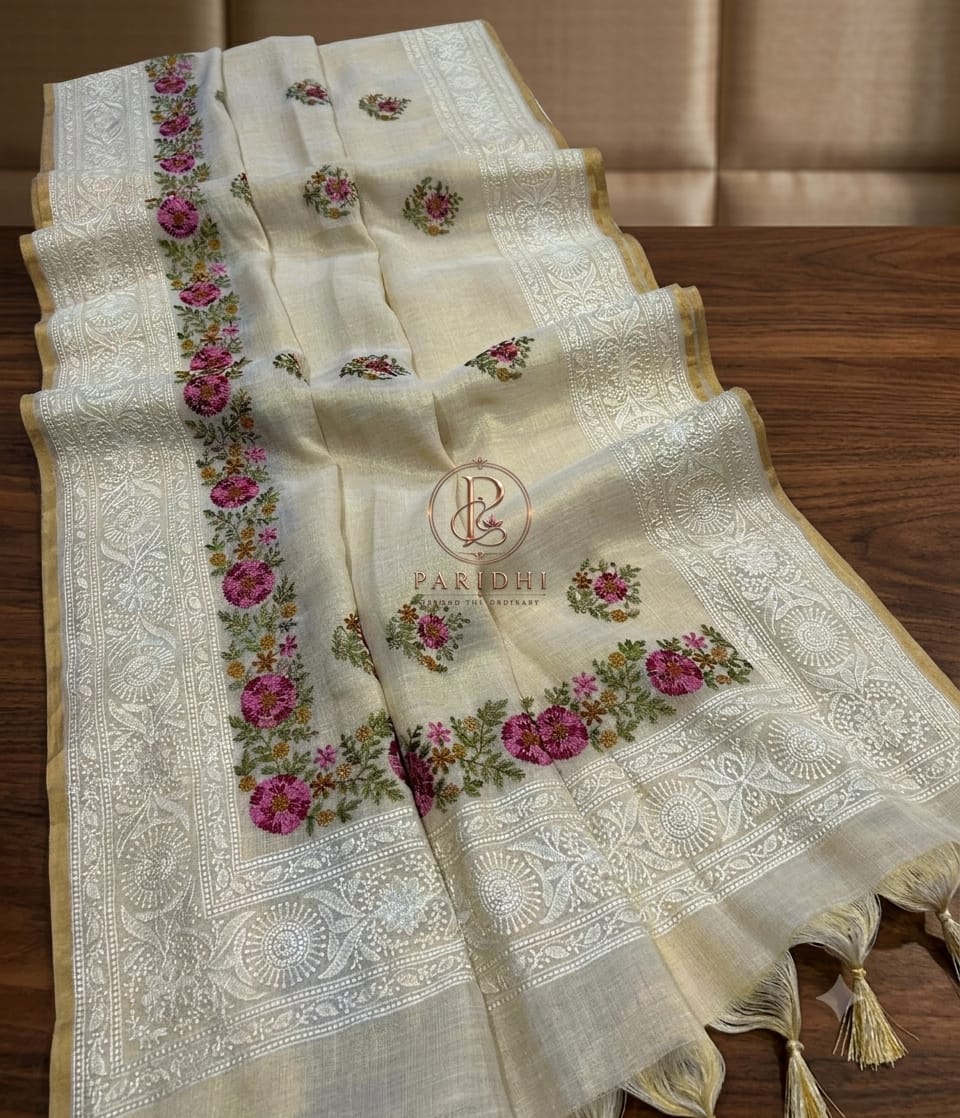 Ivory linen tissue saree with magenta and rose resham embroidery