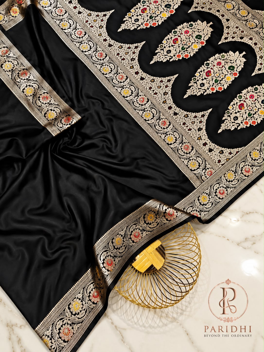 Glossy black mashroo saree with gold kalka pallu and floral border