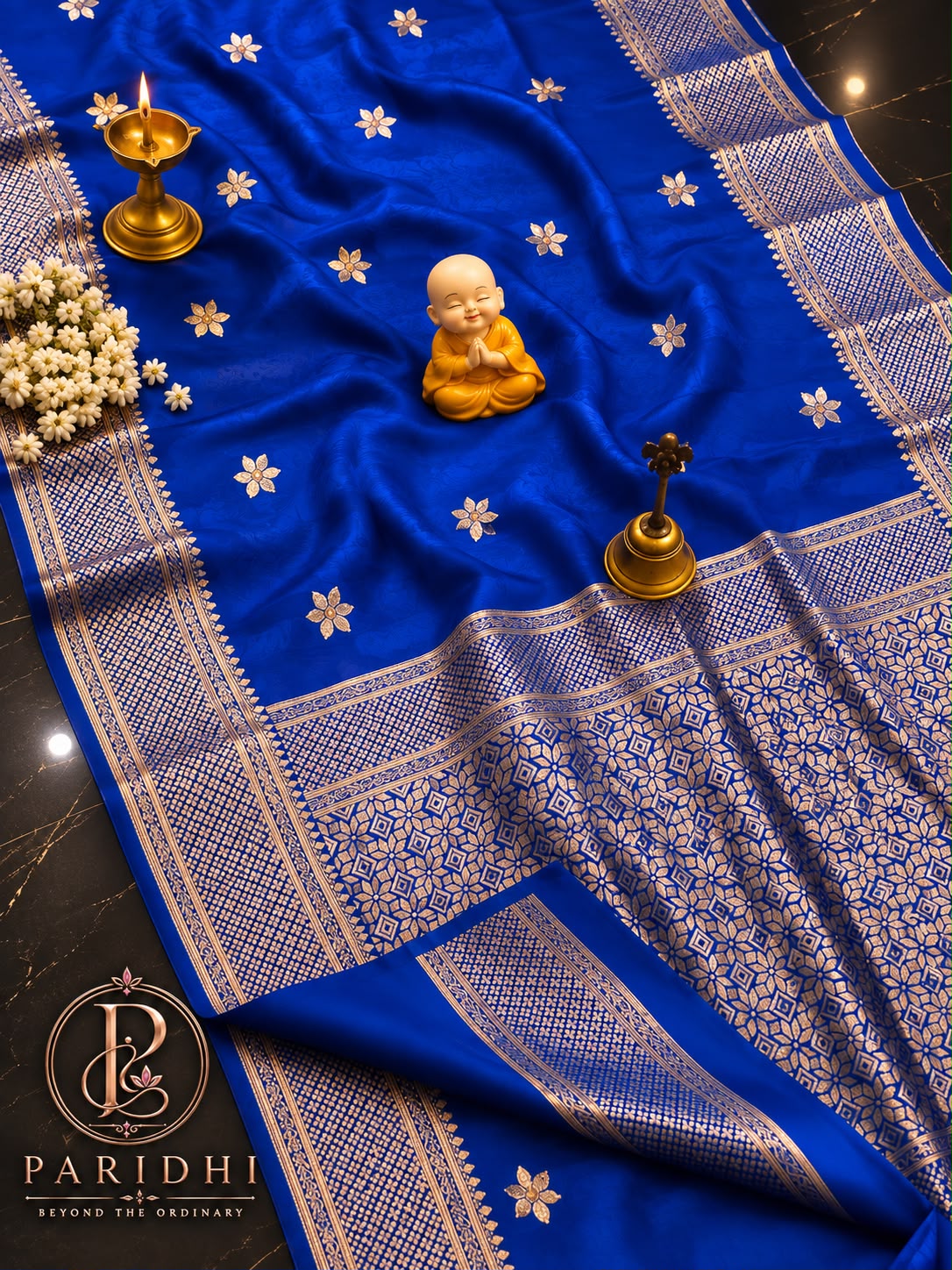 Royal blue Tanchui katan silk saree with gold star jaal pallu