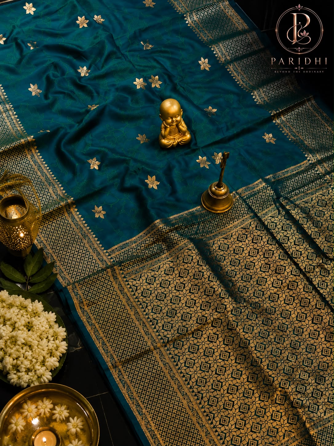 Peacock blue Tanchui katan silk saree with gold woven pallu