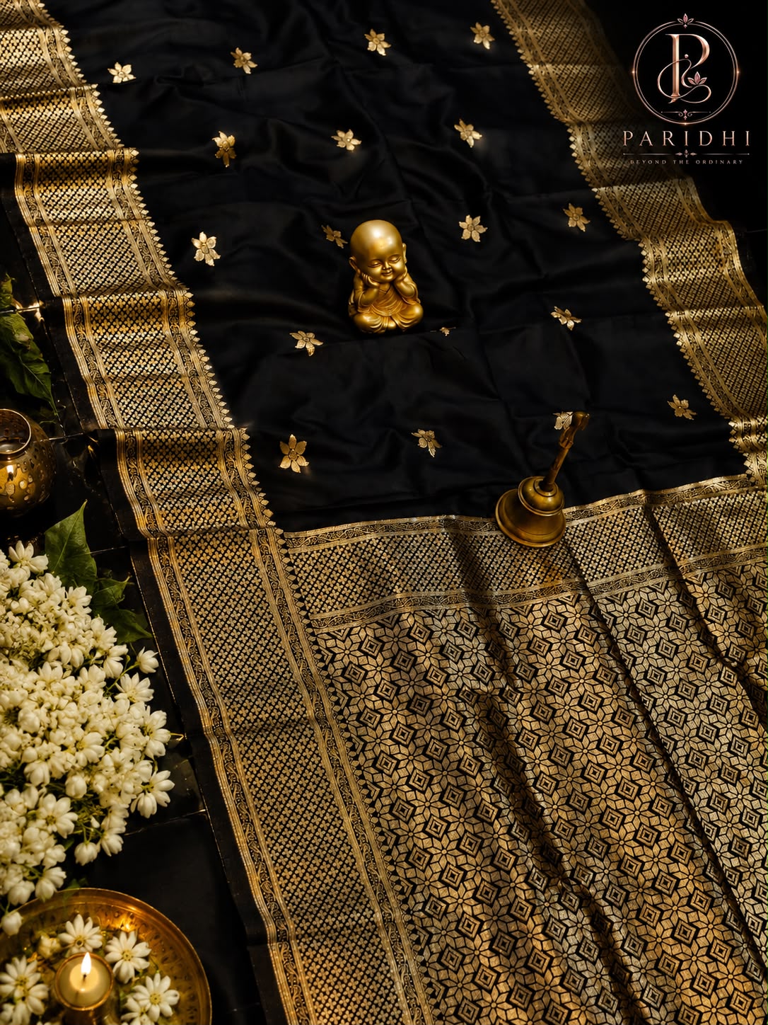Black Tanchui katan silk saree with golden buttas and geometric gold pallu