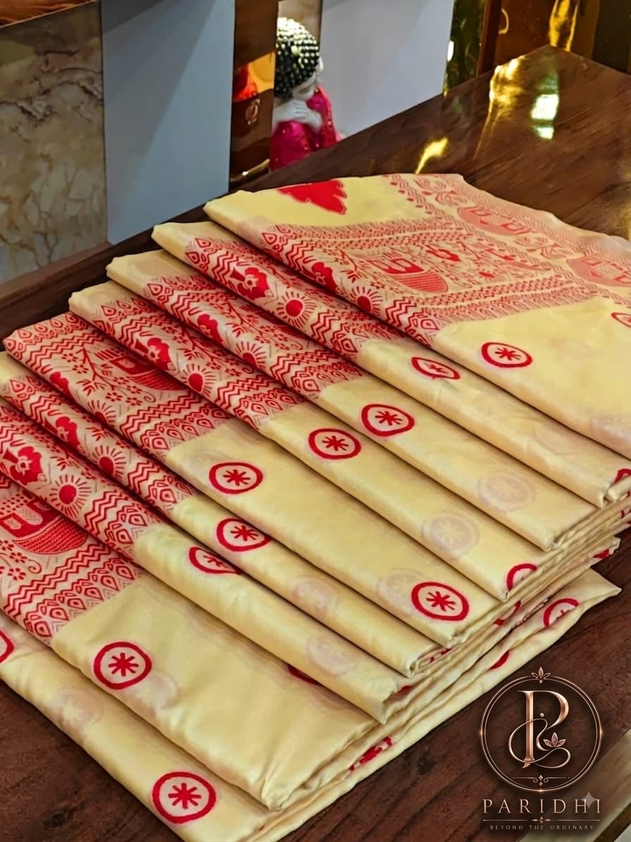 Folded tashar saree showing the exclusive tashar tone and solar medallion motifs