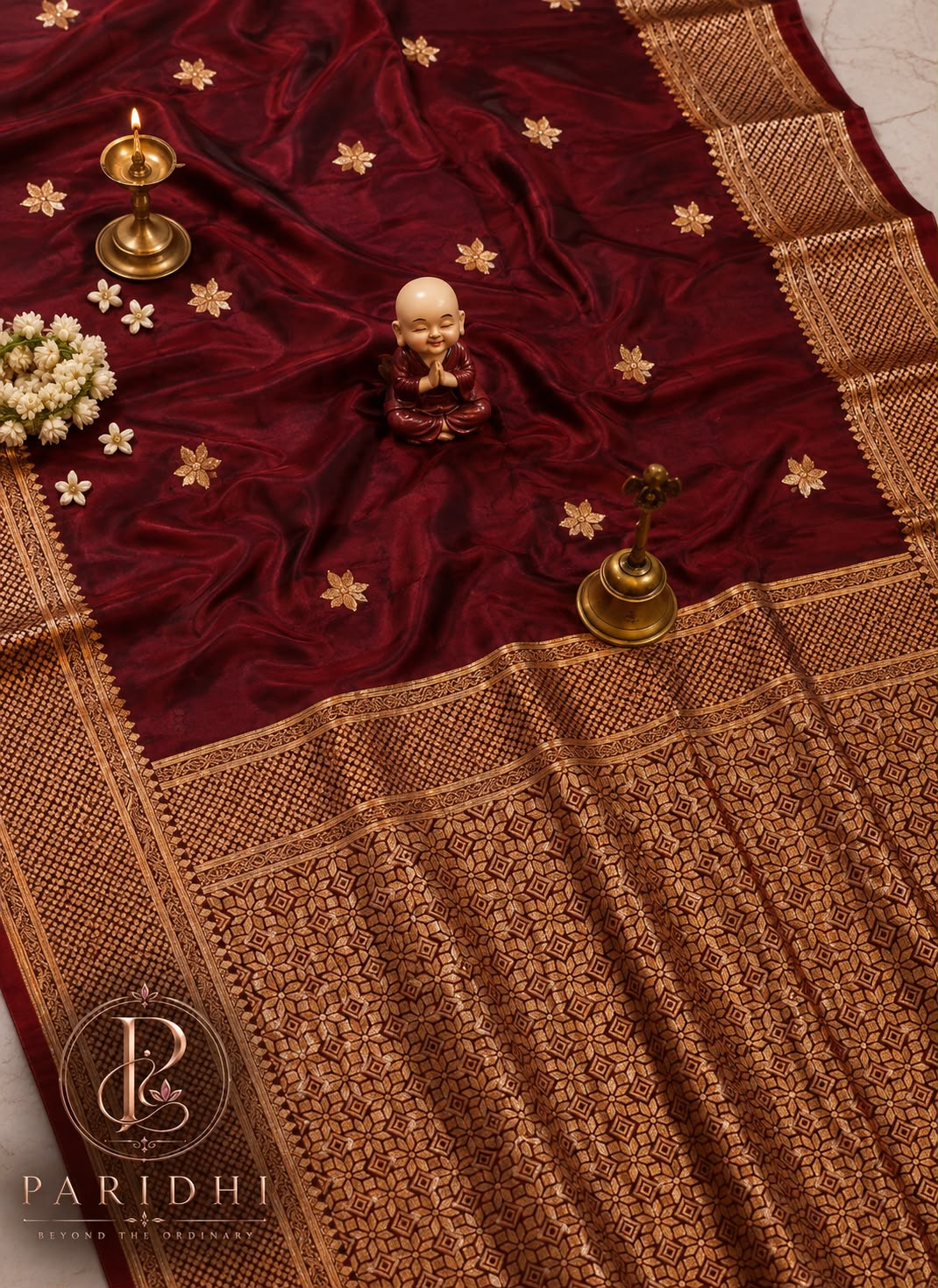 Deep maroon Tanchui katan silk saree with antique gold pallu